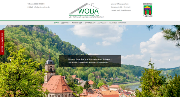 Desktop-Ansicht der Woba-Pirna.de Website mit Wohnungsangeboten und Serviceinformationen